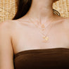 Rael Cohen Layered Look Featuring Chakra Necklace Simple Triangle Necklace And Hand Drawn Flower Necklace In Gold
